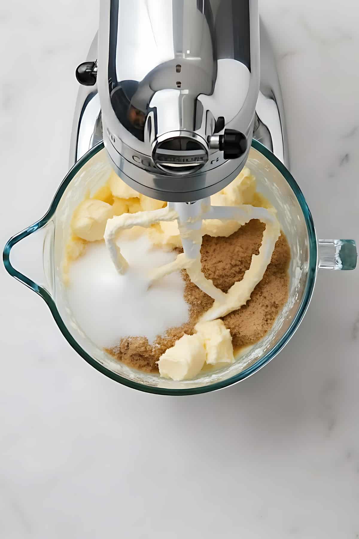 Cream, sugar, and butter mixture for cookie baking.