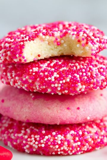Colorful sugar-coated Valentine's cookies with sprinkles.