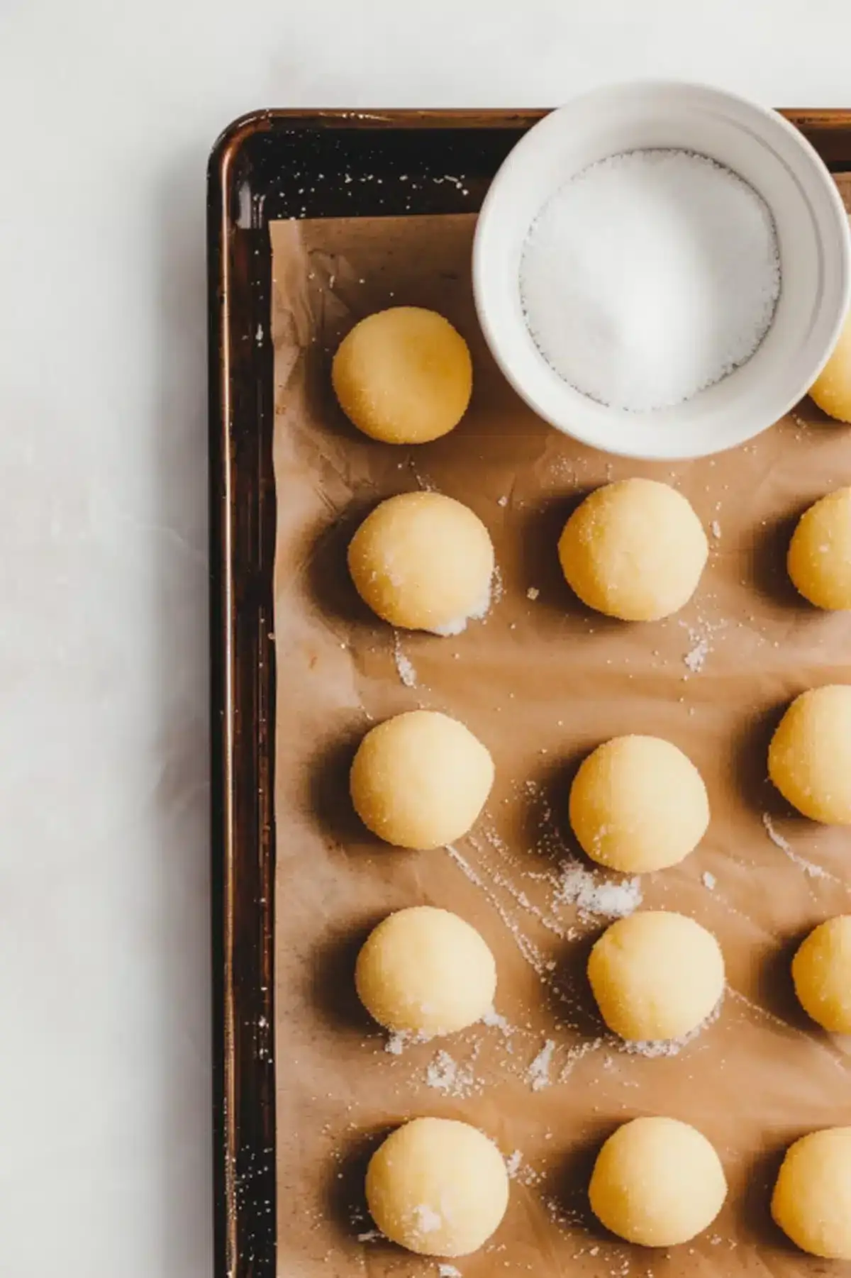 Delicious cookie dough balls ready for baking, perfect for homemade cookies and sweet snacks.